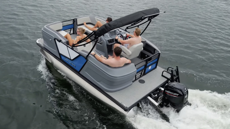 Four young adults lounging in a Sylvan A 16 LZ