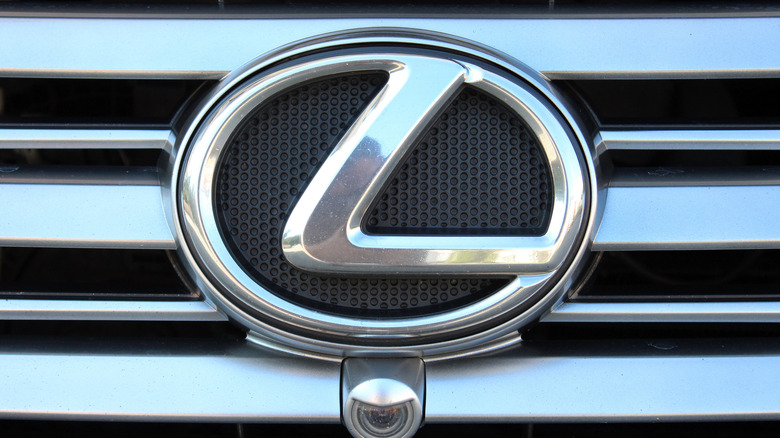 A close-up photo of the Lexus logo