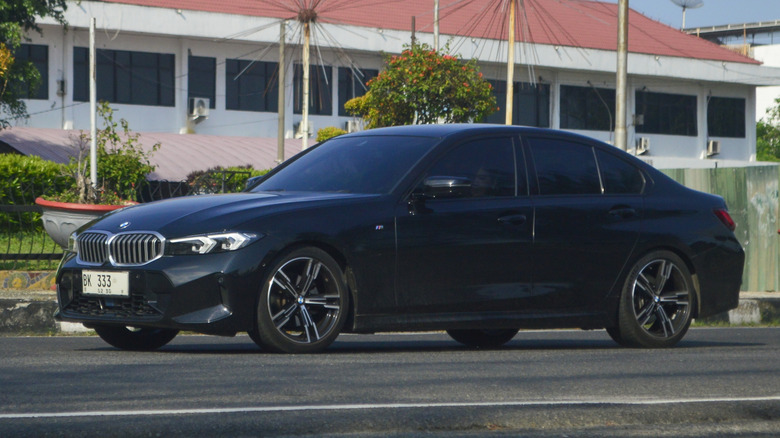 A BMW 3 Series on a city street