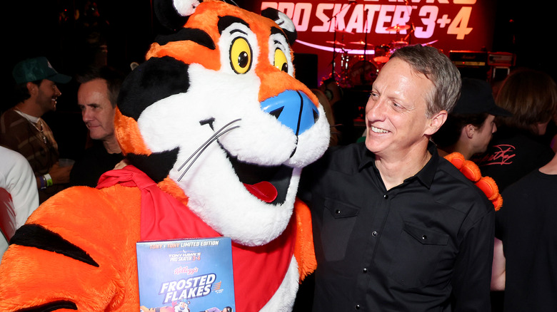 Tony Hawk with Tony the Tiger holding cereal
