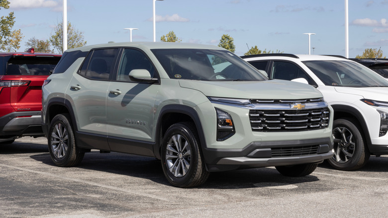 A green Chevrolet Equinox LT FWD Small Family SUV on display