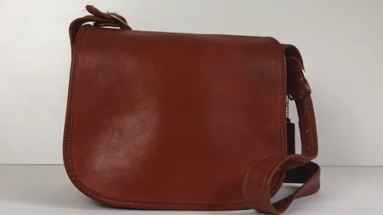 A vintage brown 1970s Coach Classic Pouch bag