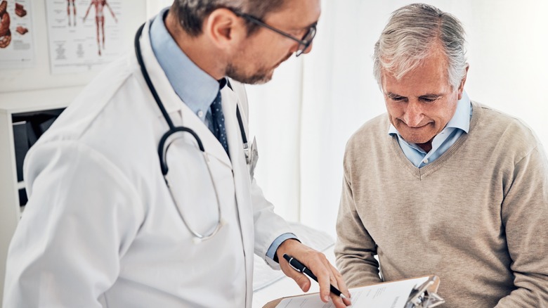 a senior visiting a doctor
