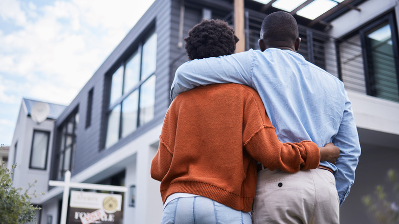couple looking at their new home