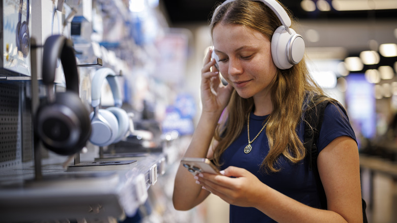 young person shopping for tech gear