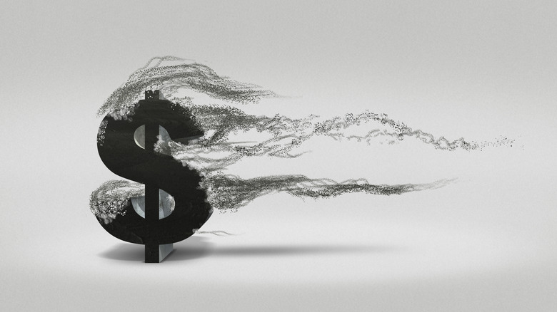 Dollar sign blowing away.