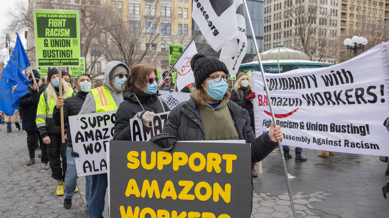 Amazon union organizers with signs