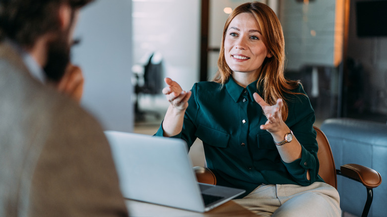 a financial advisor talking to her client