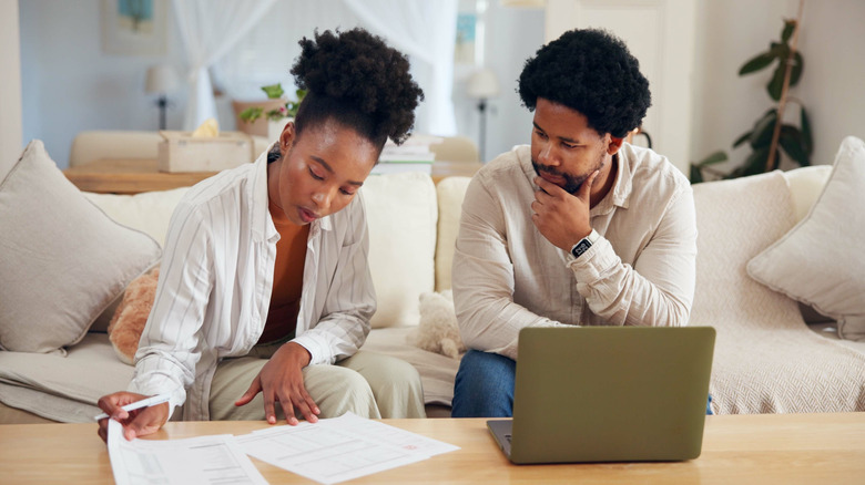 couple looking over their budget
