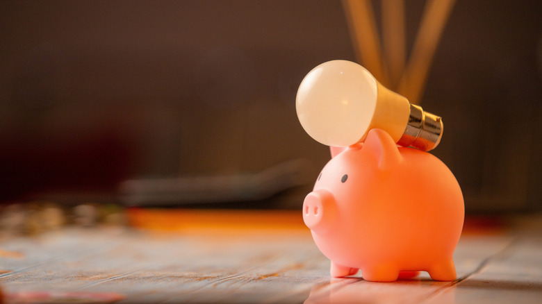 smart light bulb on a piggy bank