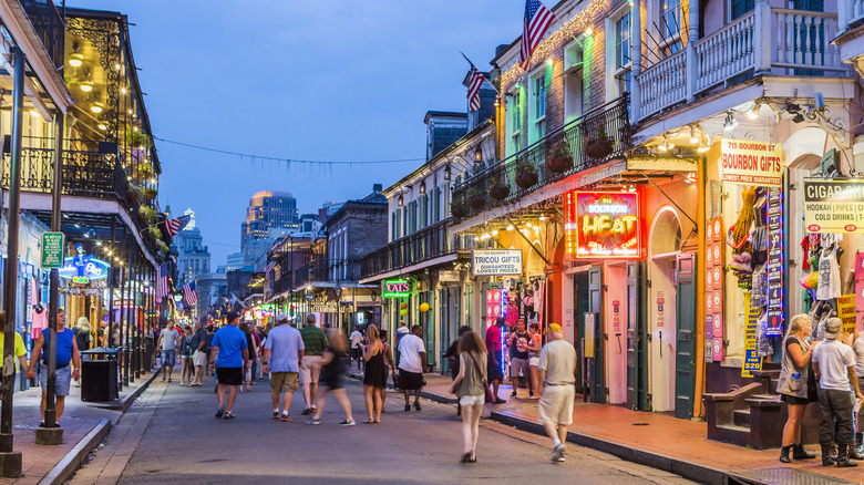 A view of the Bourbon Street in the French Quarter at twilight.