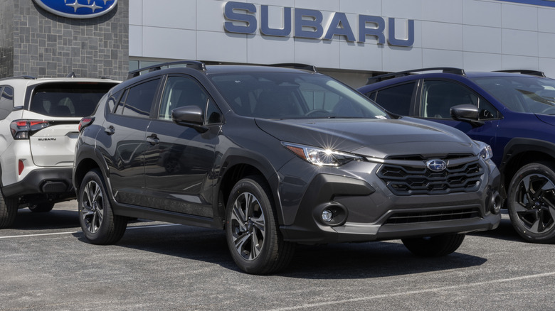 Subaru Crosstrek Premium Compact SUV at a dealership.
