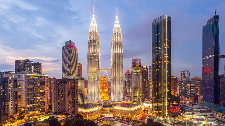 Early evening skyline view of Kuala Lumpar, featuring the Twin Towers