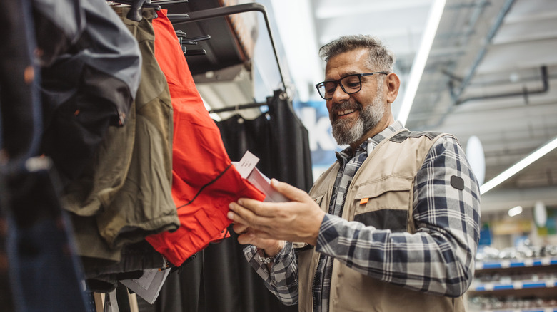 Older man shopping for clothes