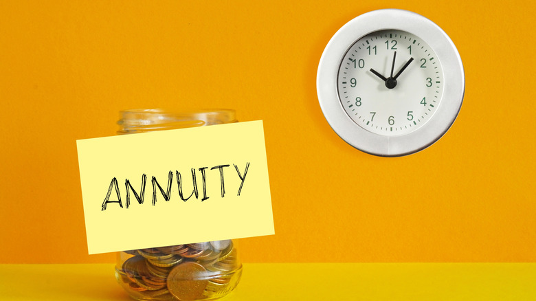 annuitiy on a post-it note over coin jar