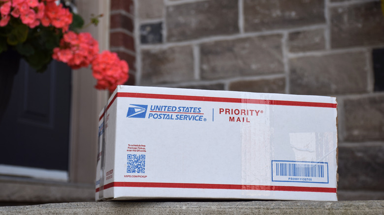 A USPS box on the front steps