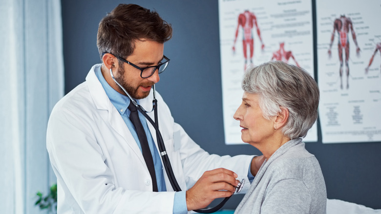 A senior-aged woman visiting her doctor