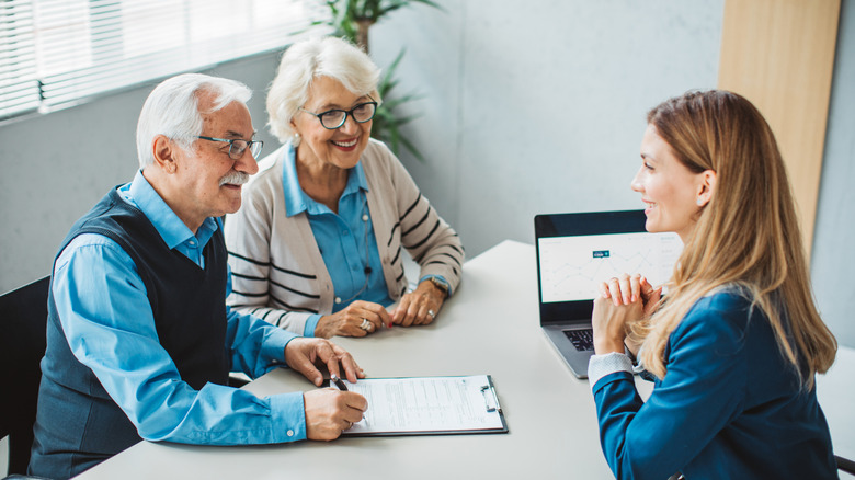 a senior couple updating their estate planning documents