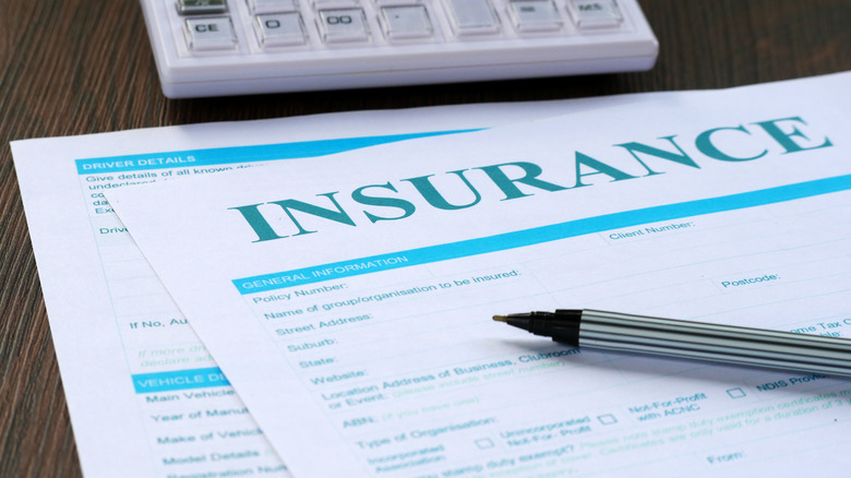 insurance documents on a table