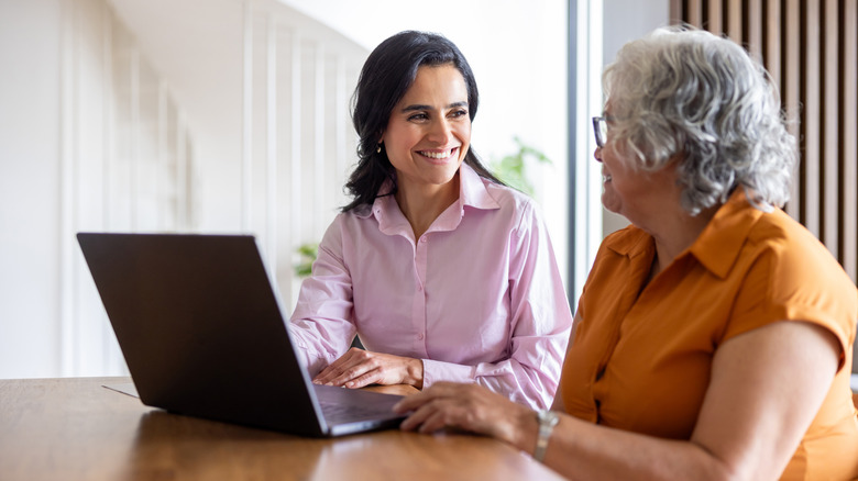 financial planner talking to senior client