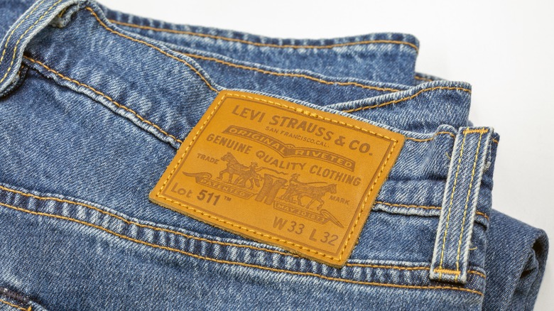 Close up of folded pair of Levi's Jeans with vintage leather patch