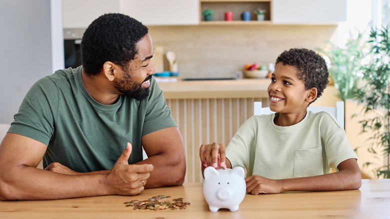 man and child saving together