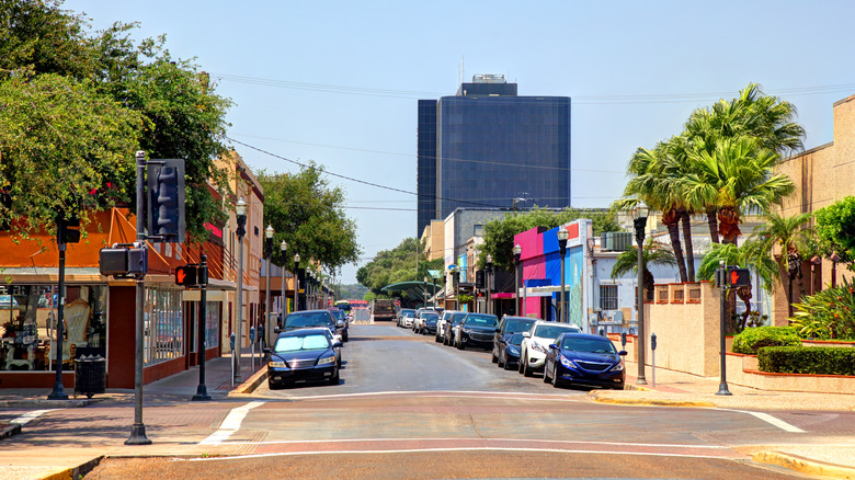 Street in McAllen Texas with skyscraper in the distance