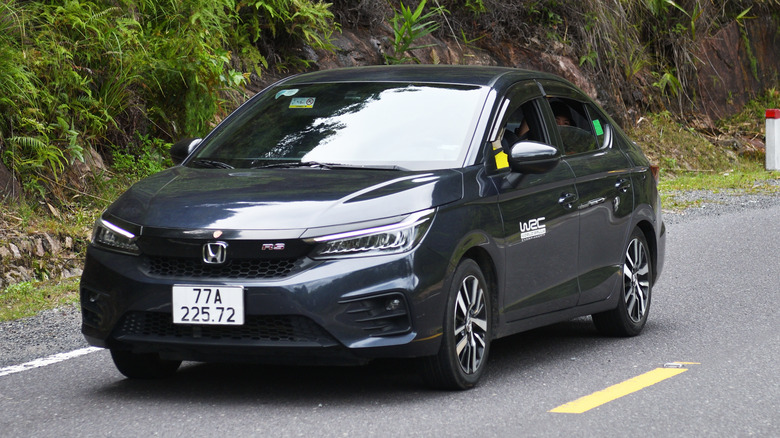 2021 Honda City RS Subcompact car on the road in the mountains.