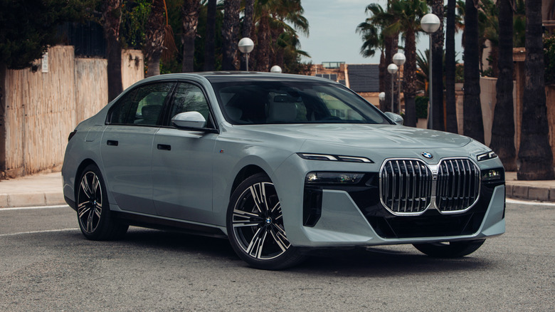 BMW 740 G70 2024 luxury sedan at the center of the street
