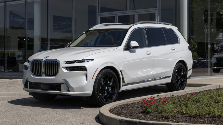 BMW X7 xDrive40i luxury SUV display at a dealership.