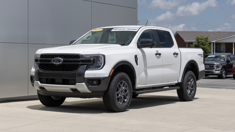 Ford Ranger Supercrew 4X4 XLT pickup display at a dealership.