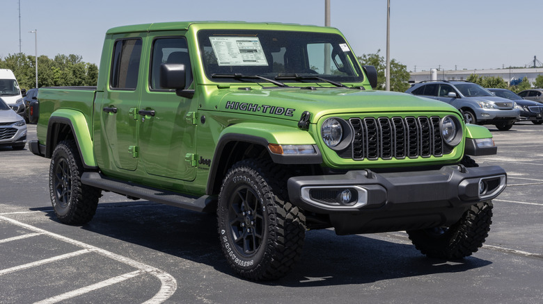 Jeep Gladiator Sport 4X4 High Tide at a dealership.