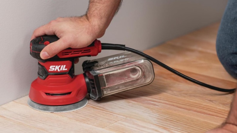 sanding with Skil sander