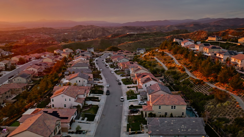 Aerial photograph of low-rise housing in Santa Clarita, California at sunset.