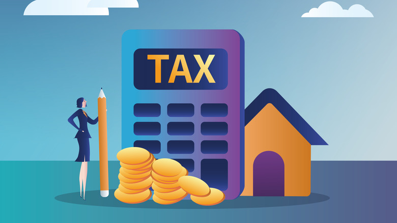 Business woman calculating house tax.