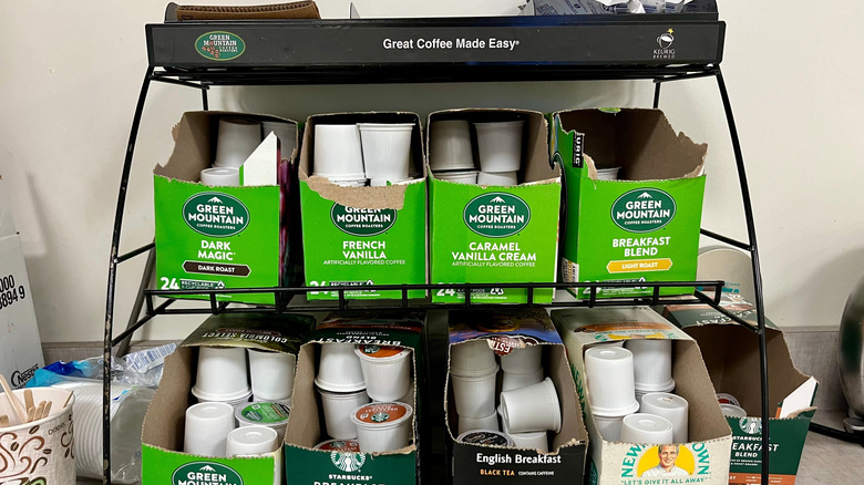 A rack filled with a variety of coffee pods