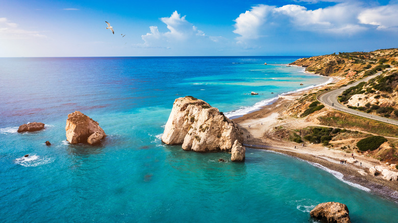 Shot of Mediterranean coast with winding road along beach
