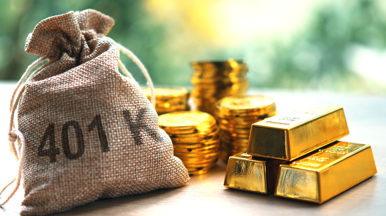 money bag with 401(k) on the side and gold bars