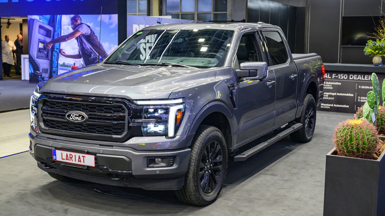 A grey Ford F150 pickup truck on display.