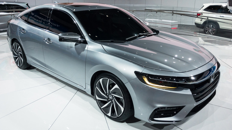 A silver 2019 Honda Insight on display at the North American International Auto Show.