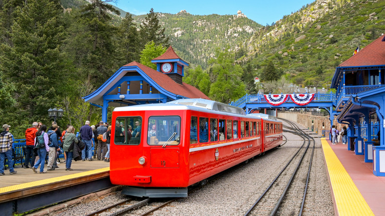 People boarding a train on the Manitou and Pike's Peak Cog railway.
