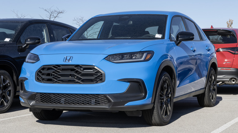 A blue Honda HR-V AWD Sport Compact Crossover SUV display.