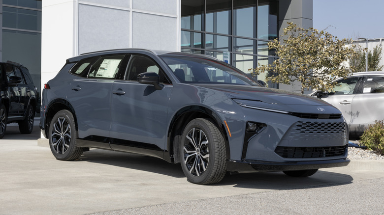 A dark grey Toyota Crown Signia XLE Sport Utility on display.