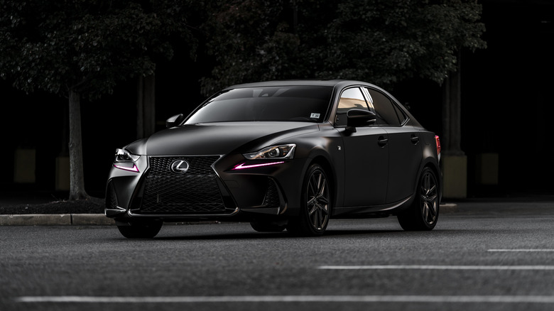 A black Lexus IS 300 F.