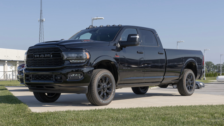 A black Ram 3500 Limited Crew Cab 4X4 on display.