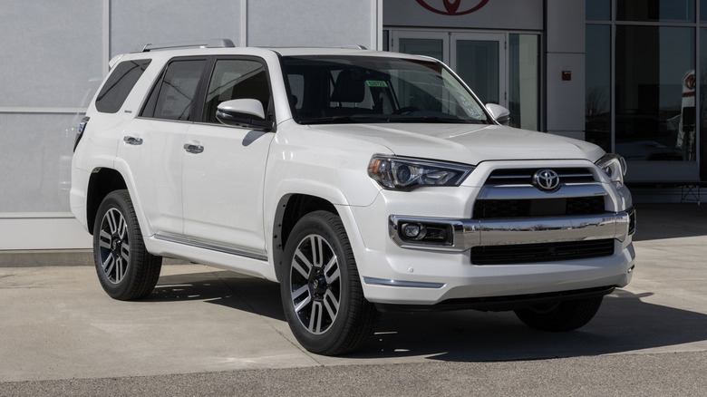A white Toyota 4Runner Limited on display at a dealership.