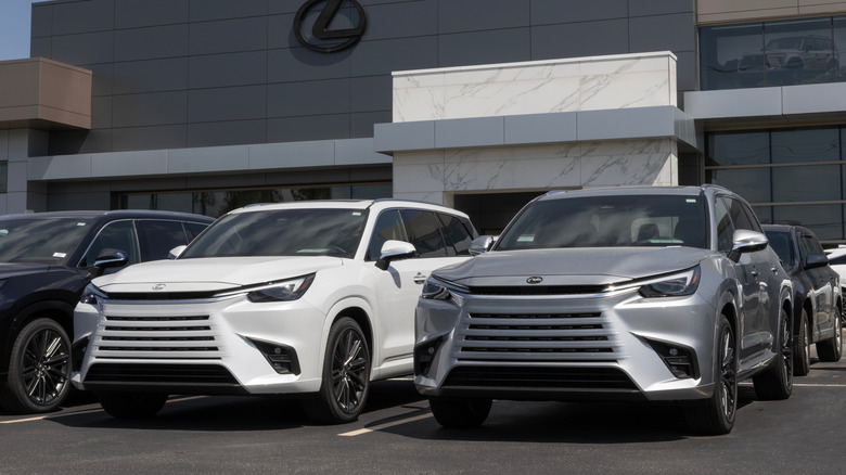 Lexus TX 350 three-row SUV display at a dealership.