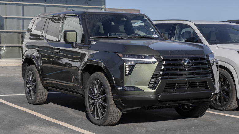 Lexus GX 550 AWD Luxury SUV display at a dealership.