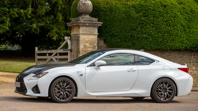 Lexus RC car driving through an English village.