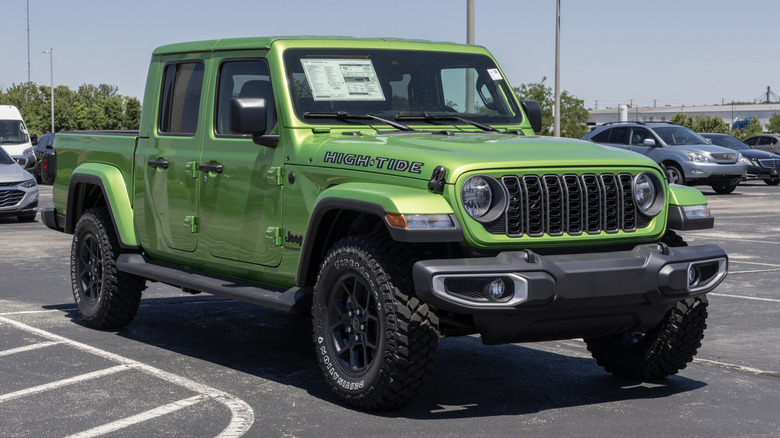Jeep Gladiator Sport 4X4 High Tide at a dealership.
